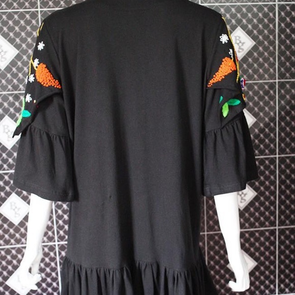 Women top wearBody hanging tunic with flare at hem - Picture 2 of 4